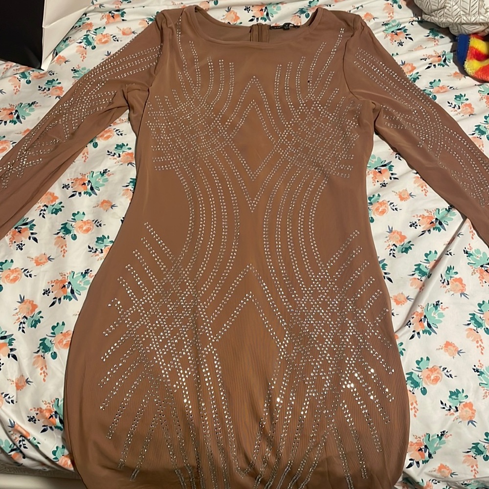 Beige sparkly dress.